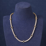 BLACK MOTIF TENNIS CHAIN - GOLD